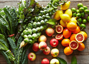 a group of fruits and vegetables on a wood surface Healthy Weight Loss Diets Finchampstead